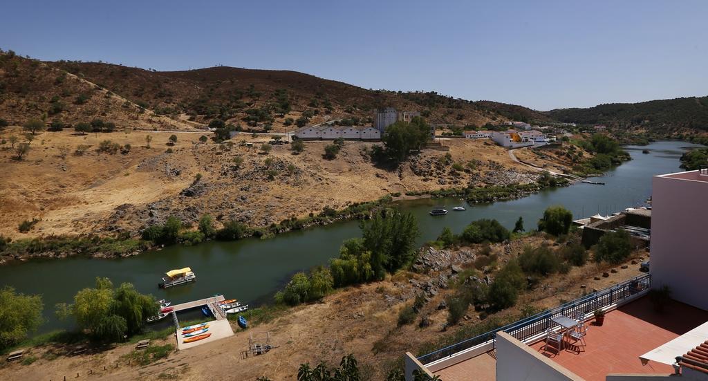 Alojamentos Oasis 메르톨라 객실 사진